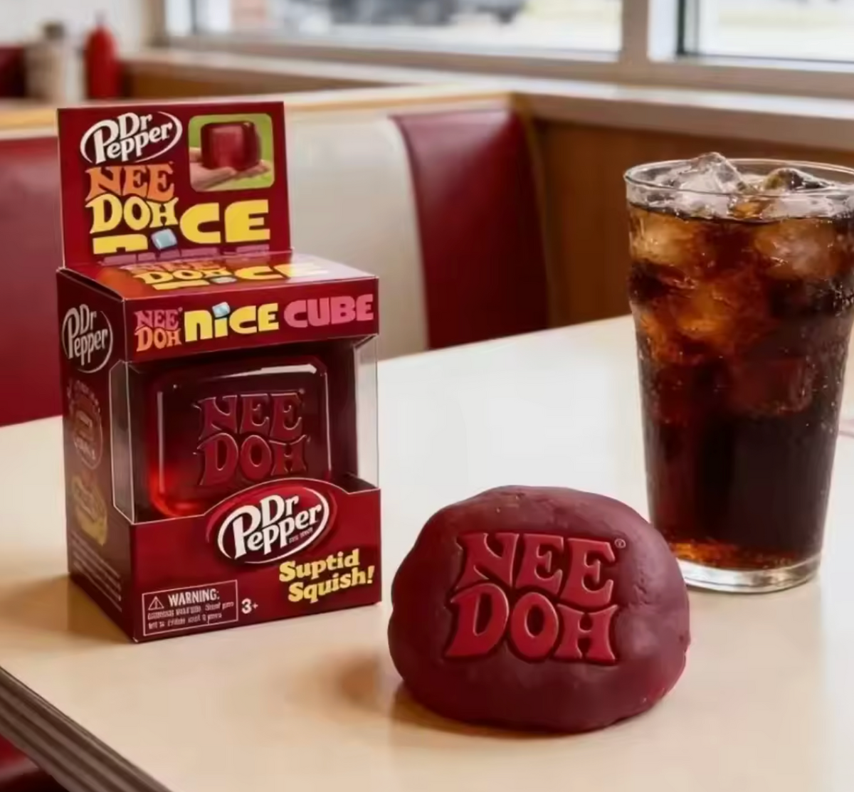 NeeDoh Dr Pepper Nice Cube limited edition box and red translucent cube product flat lay