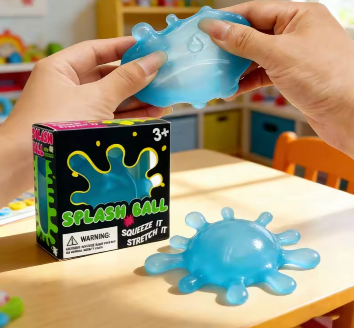 Blue, purple, and green NeeDoh SplootSplat sensory squeeze toys with stretchable blob extensions